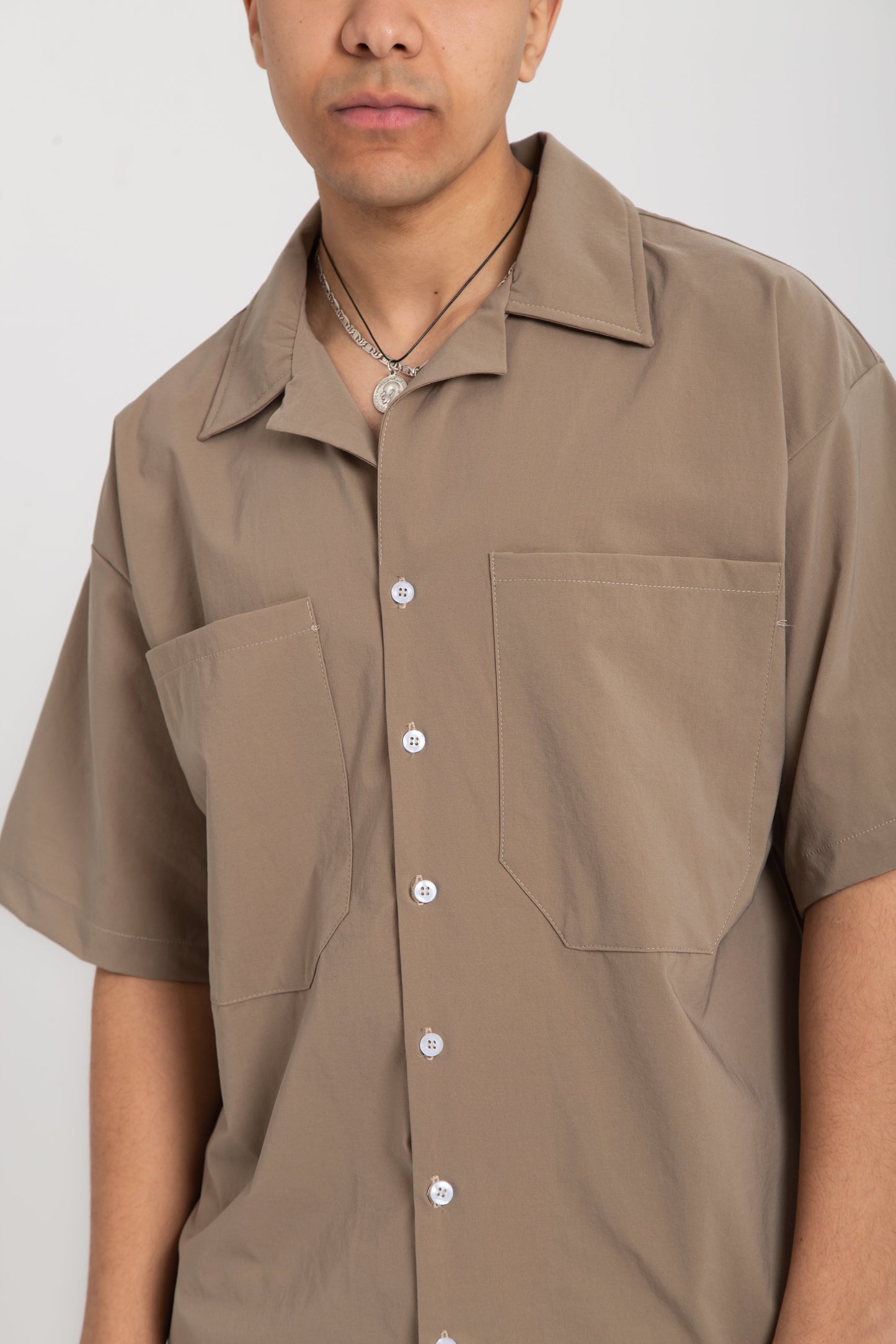 Oversized shirt with front pockets