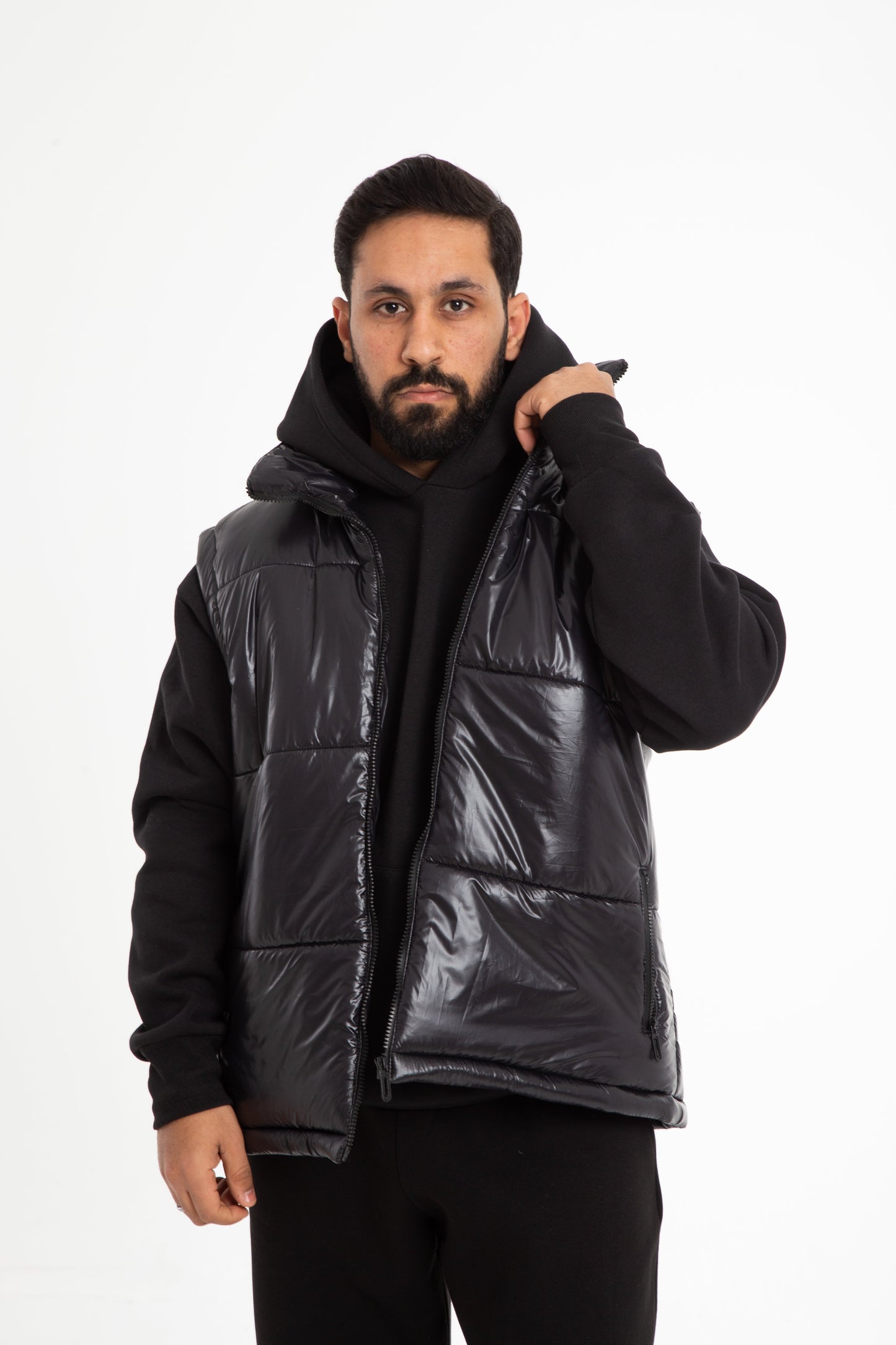 Puffer vest with hidden hoodie