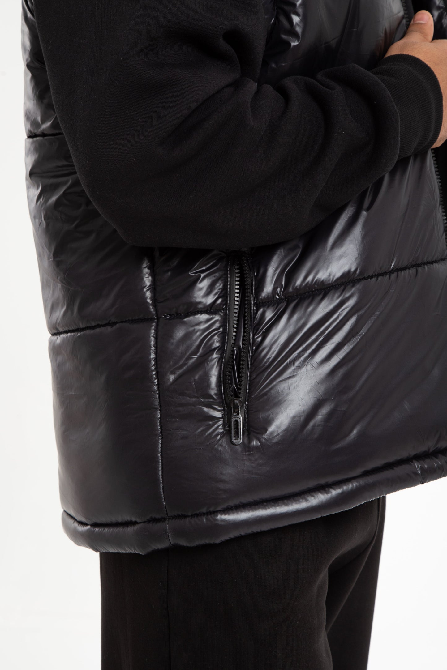 Puffer vest with hidden hoodie